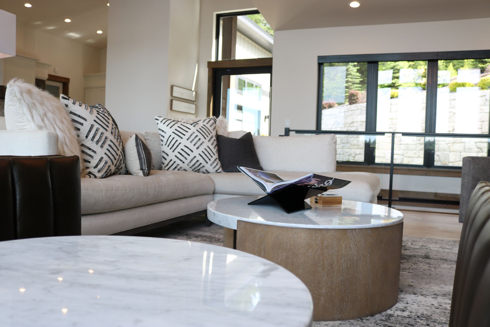 Lounge with a round coffee table, Millview Renovation
