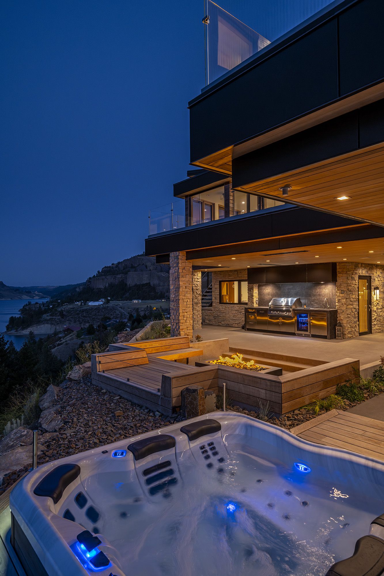 Upper terrace and hot tub at night, Roosevelt