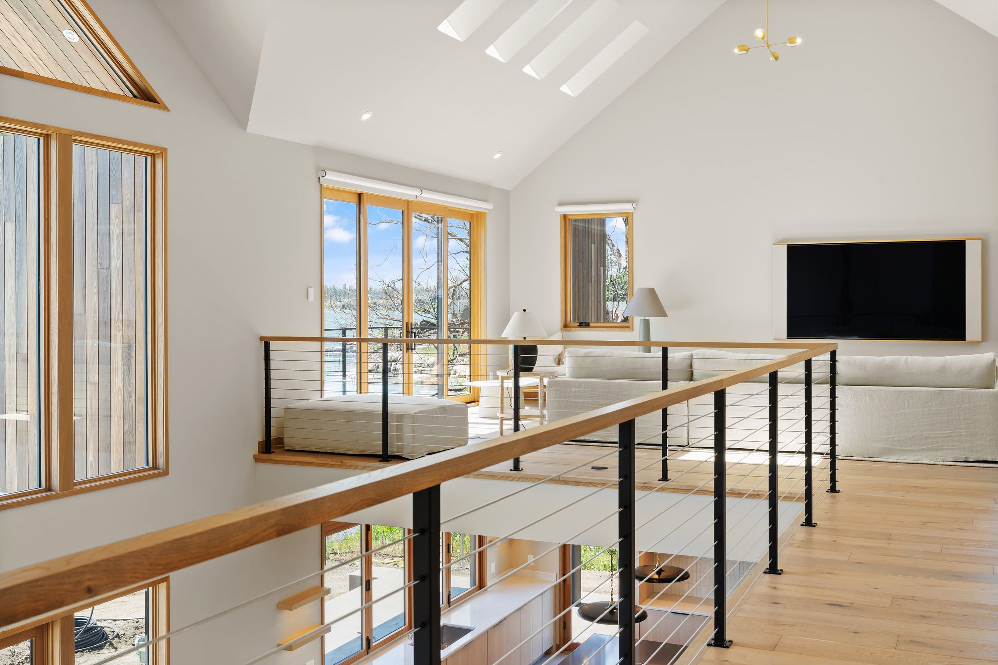 Open loft with cable railings and vaulted ceiling, Silver Lake