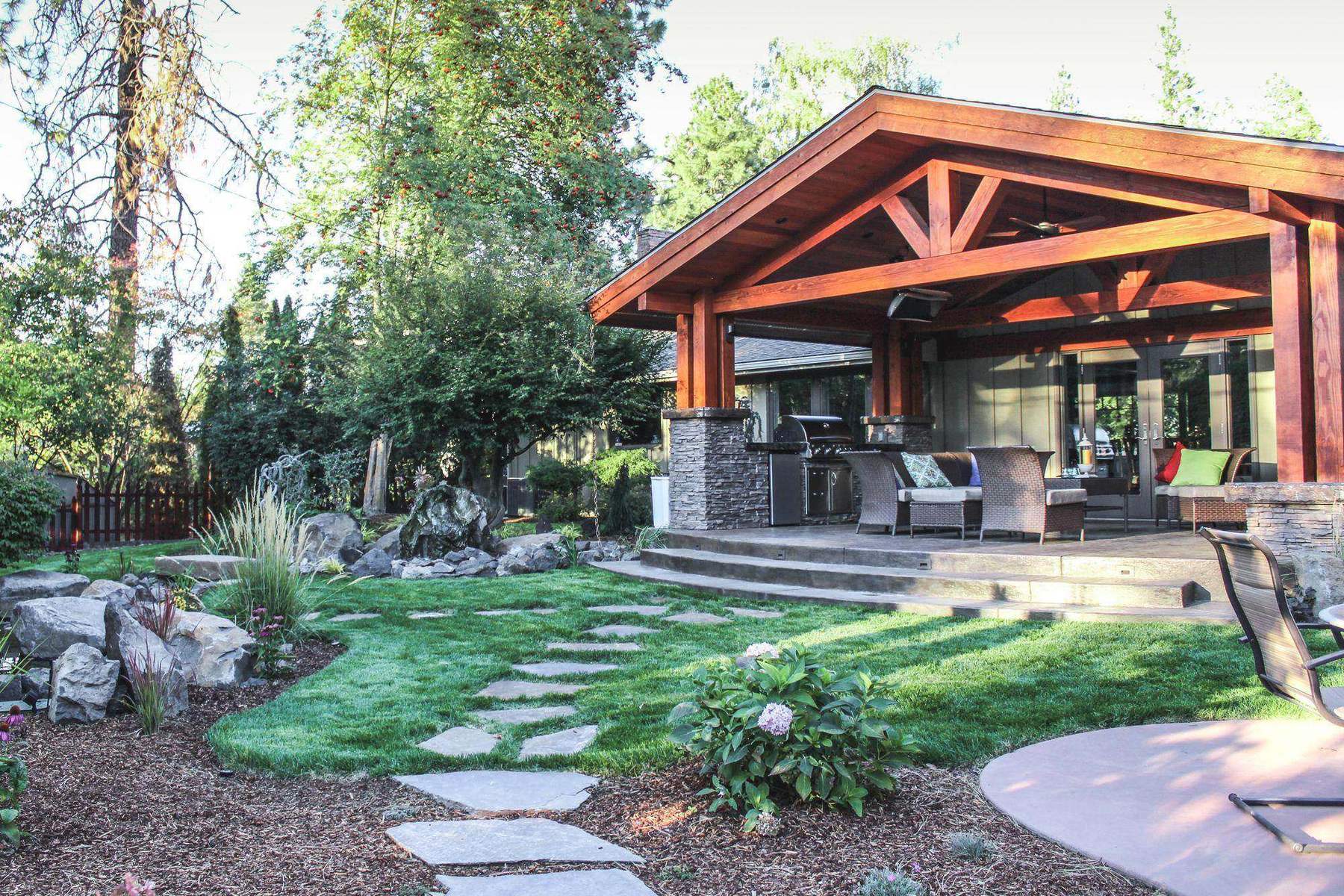 Timber-framed pavilion in the garden, South Spokane Renovation
